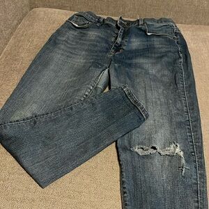 BDG blue jeans with hole in left knee